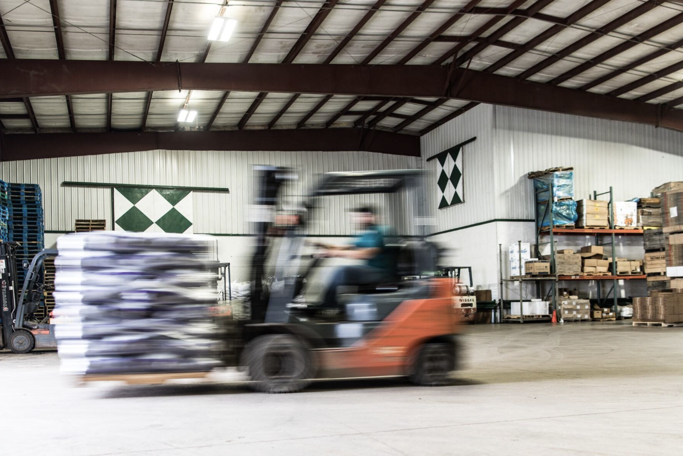 A forklift moves products within a food hub.